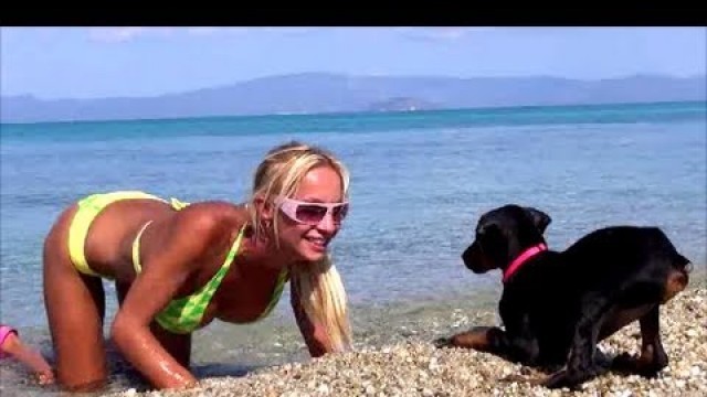 'Doberman Puppy vs. Blonde Fitness Girl -  BIKINI BEACH FIGHT!'