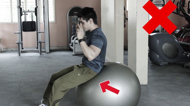 'HOW TO DO: Stability Ball Crunch (1 Minute Video) | DP Fitness'